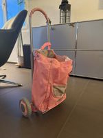 Einkaufstrolley rosa mit Gebrauchsspuren defekt