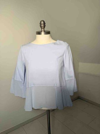 Damen Bluse hellblau mit Schoss neuwertiger Zustand