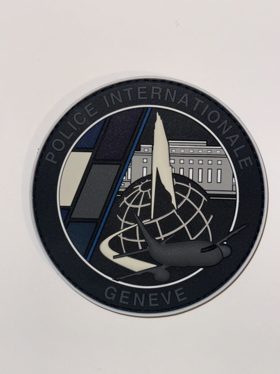 Swiss Placchette & Badge: Police Internationale Genève – Nuovo e nell'imballaggio originale da Castione venduto da DWNL