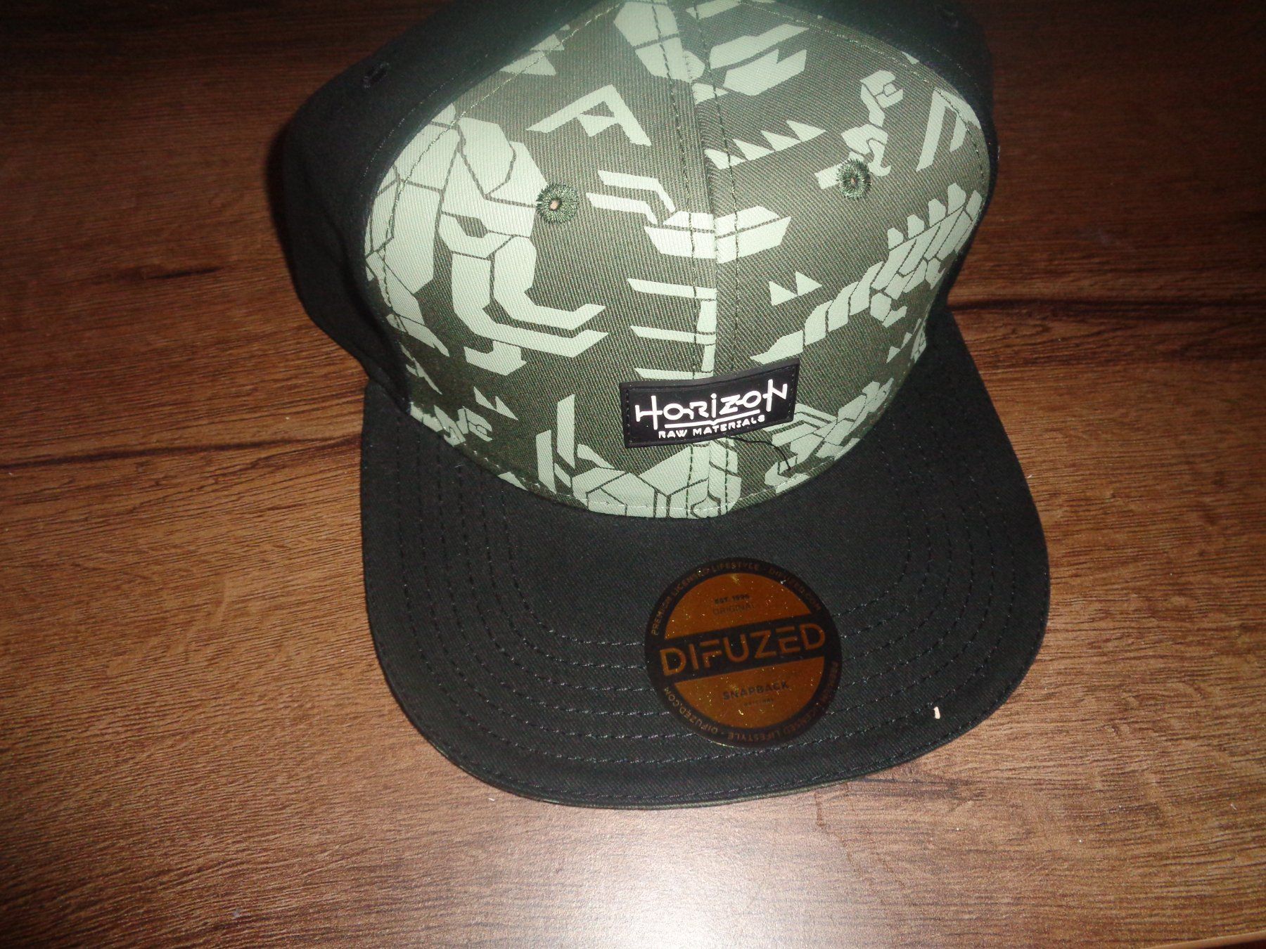 Giochi: Horizon Forbidden West - Snapback Cap – Nuovo e nell'imballaggio originale da Olten venduto da Disc-Ausverkauf