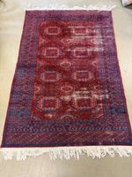 Orientteppich mit Muster rot/blau Alt Defekt