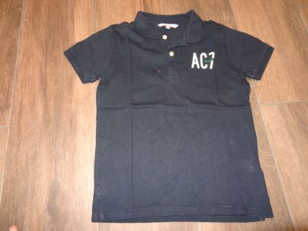 Polo Cyrillus enfant taille 10 ans bon état
