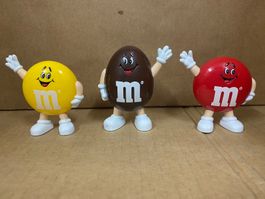 M & Ms 1991 yellow, red and brown