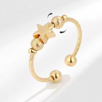Woman gold ring with star