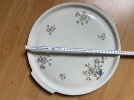 Grand plat rond en porcelaine à fleurs