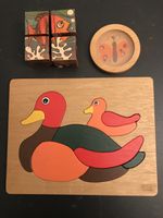 Holz Puzzle,  Würfelspiel und Geduldspiel.