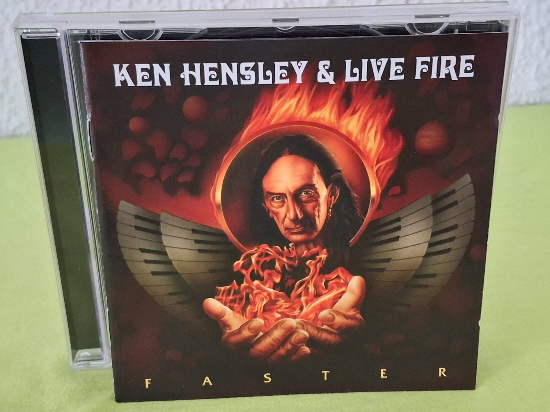 CD: CD Ken Hensley & Live Fire - Faster – Usato da Aarberg venduto da Jackup1