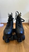 Rollschuhe schwarz