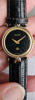 Montre dame Gucci vintage, bracelet en cuir noir