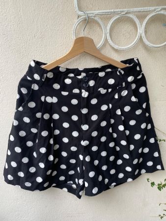 Shorts à pois noirs et blancs taille L état neuf