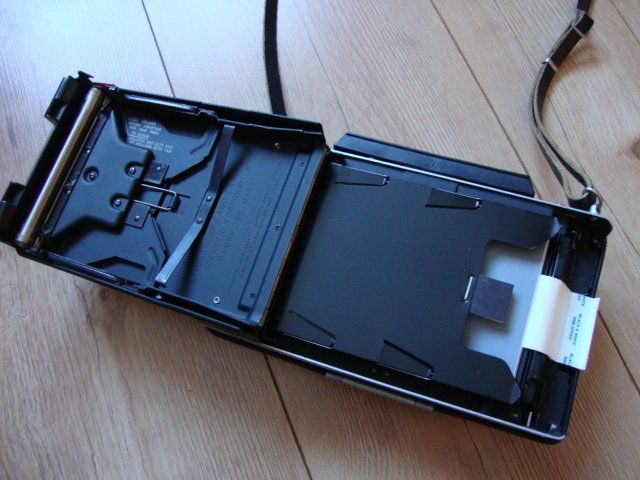 How to use a land camera, specifically a Polaroid
