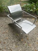 Inox Dexignerstuhl mit Lochmuster für Innen oder Aussen