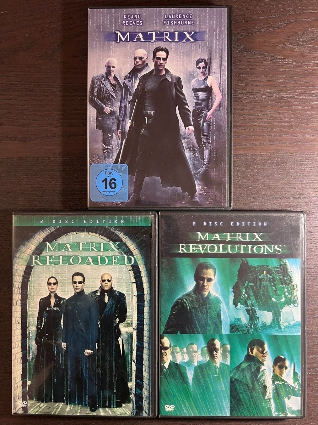 Alle DVDs: Matrix Trilogie – Gebraucht aus Zürich von FilmFreunde