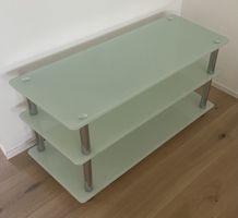 Green glass trapezoid shape TV table