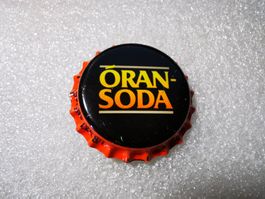 Ansteckpin 63: Oran-Soda
