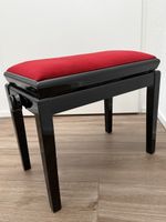 Klavierbank schwarz rot höhenverstellbar