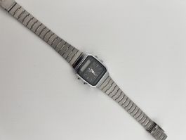 Oris dual time défectueux 