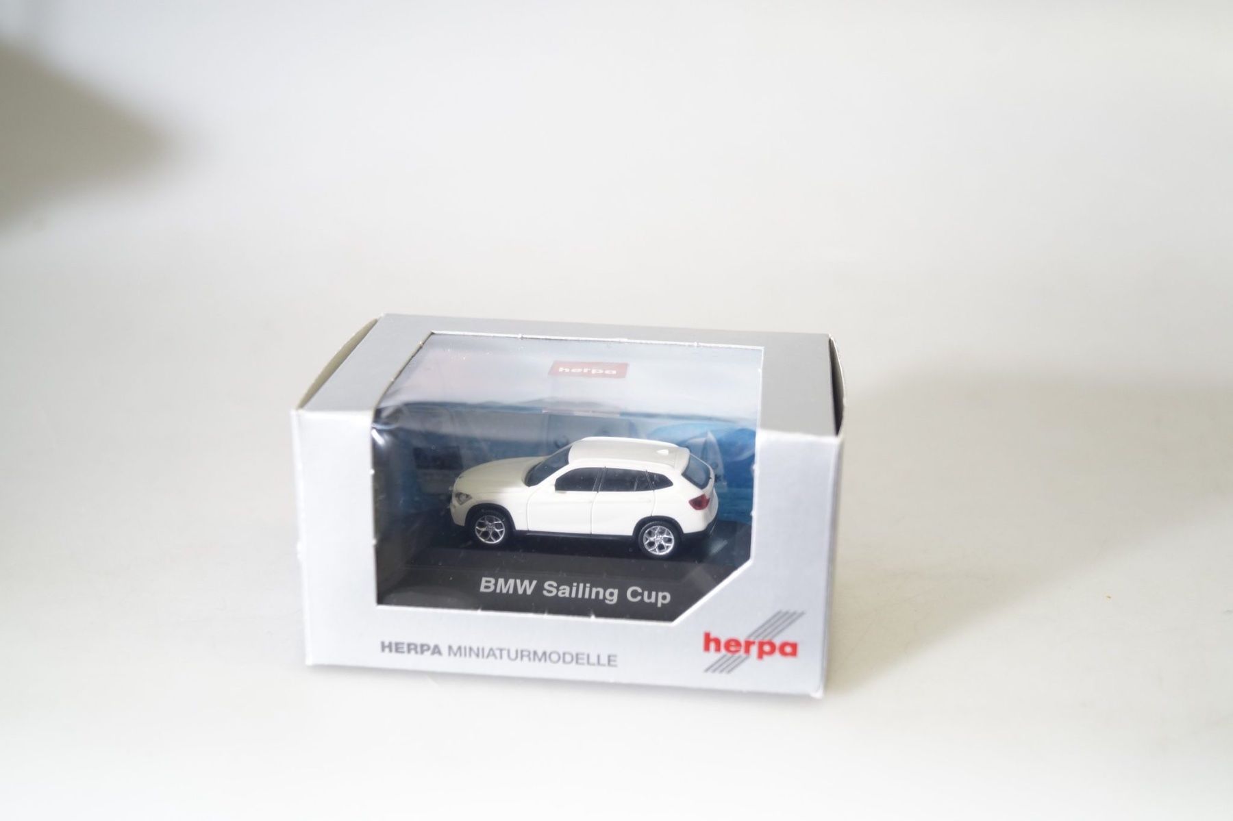 Herpa Modellini d'auto: Herpa HO 293891 BMW X1 Sailing Cup – Nuovo e nell'imballaggio originale da Montpreveyres venduto da Maleagant
