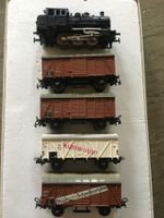 Märklin Lokomotive und 4 Güterwagen