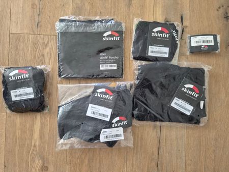 Skinfit‑Paket, alles original und neu eingepackt