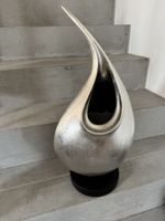 Objet décoratif argenté en forme de goutte