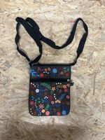 Black floral crossbody bag with adjustable strap 