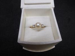 Bague or jaune 750, 2 brillants et 1 perle de culture 8mm