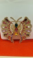 Brosche Schmetterling goldfarben mit bunten Steinen