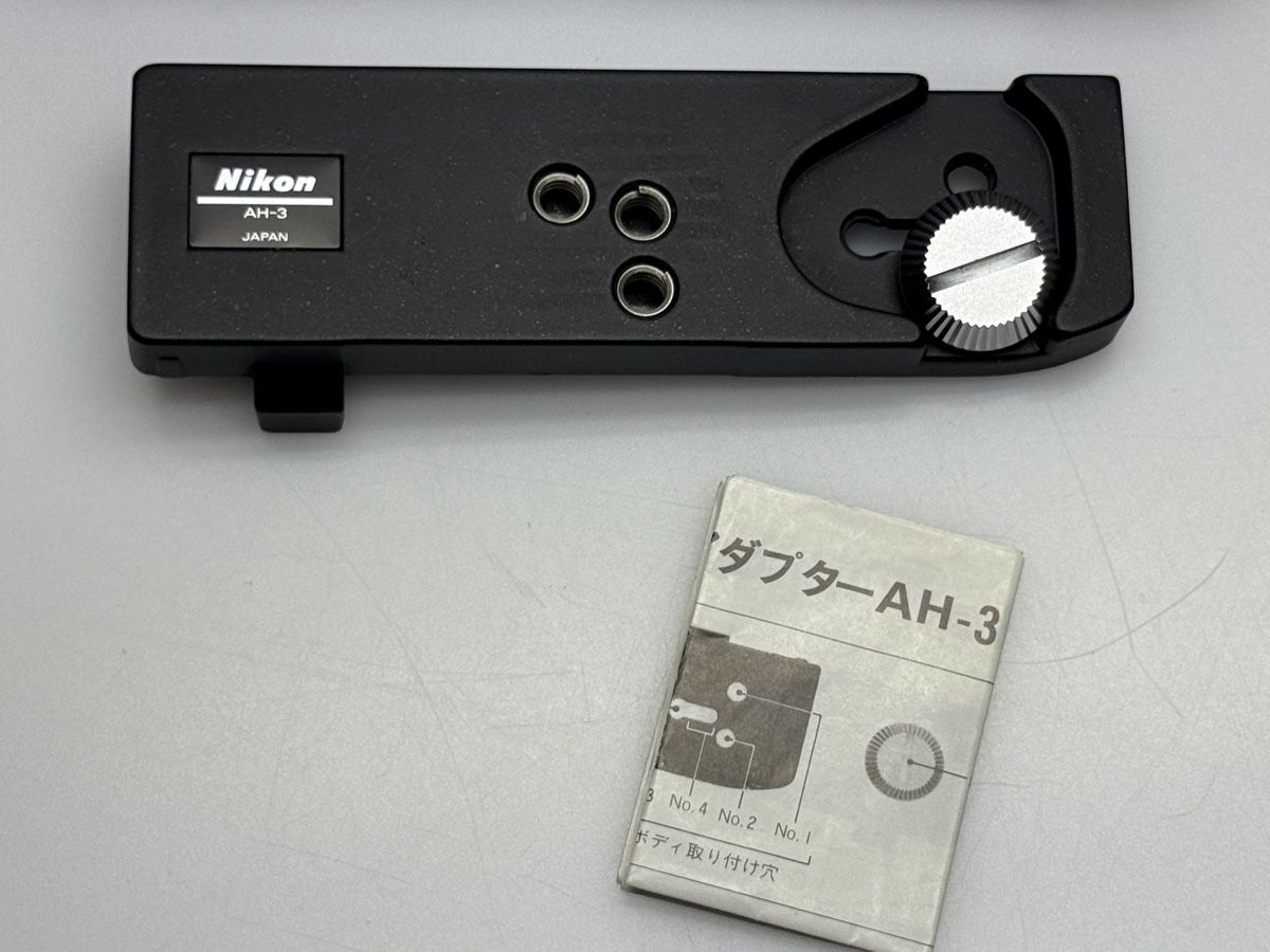 Nikon Fotocamera: Nikon AH-3 Stativadapter - Neu mit Originalverpackung – Nuovo e nell'imballaggio originale da Hägendorf venduto da Buck67 1