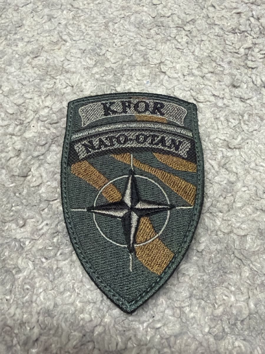 Swisscoy Plaquettes & Badges: KFOR NATO-OTAN Badge – Neuf (Voir description) à Oberuzwil par ari_s5pf