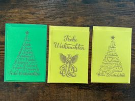 Drei Weihnachtskarten mit Umschlägen
