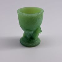Petit coquetier vintage en verre vert opalin décor poussin