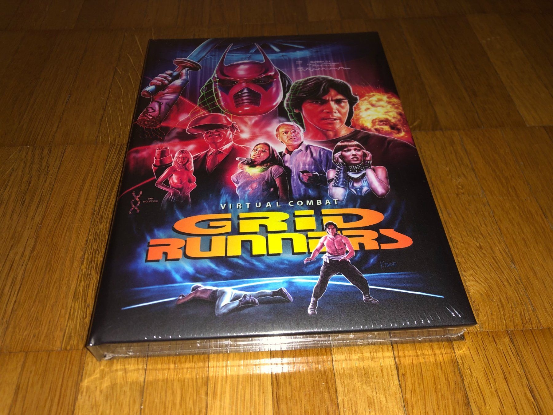 Tutti i DVDs: Grid Runners - MEDIABOOK - WATTIERT - UNCUT – Nuovo e nell'imballaggio originale da Basel venduto da havsok
