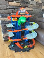 Hot Wheels Ultimate Garage mit T-Rex – grosse Parkgarage