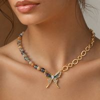 Sonnenstein Kette Halskette Collier mit Schmetterling Neu