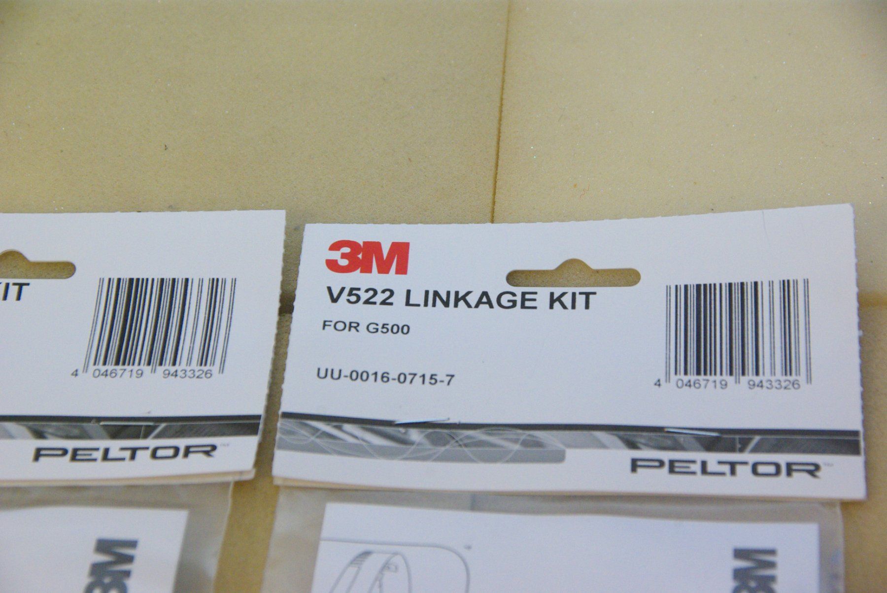 3M Protezione per viso e udito: 3M Peltor V522 Linkage Kit, in OVP – Nuovo e nell'imballaggio originale da Herisau venduto da Cevianer1844 1