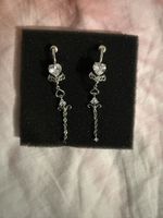 Boucles d'oreilles cœur pendantes argenté 