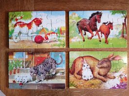 4 Tierpuzzles in Holzschachtel
