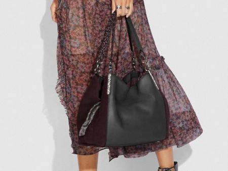 sac à main de la marque COACH neuf en cuir noir et daim