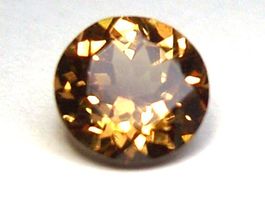 Grenat "Change Color" rond 7,1 mm / 1.63 carat