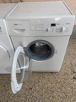 Machine a laver et machine a secher (colonne de lavage)