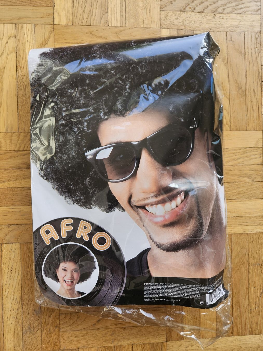 Parrucche: Kurze dunkle Afro Perücke – Usato da Ebmatingen venduto da D.A.C.