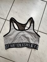 Reggiseno sportivo grigio con logo taglia S 