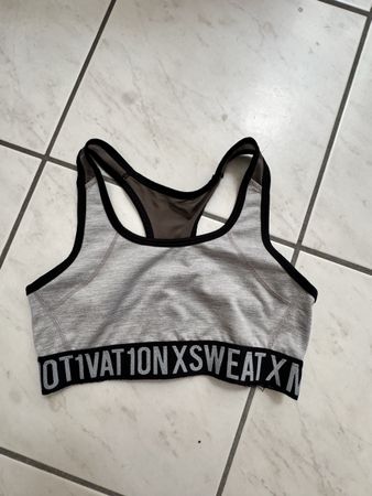 Reggiseno sportivo grigio con logo taglia S 