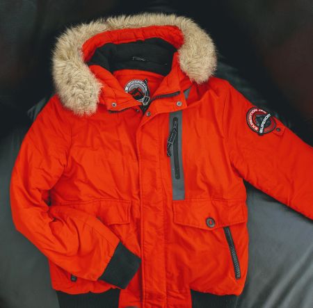 Superdry® Winterjacke, Orange-Rot/Schwarz