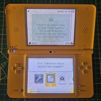 nintendo dsi xl jaune , batterie neuve 