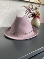 Chapeau en laine de la marque Conte of Florence.