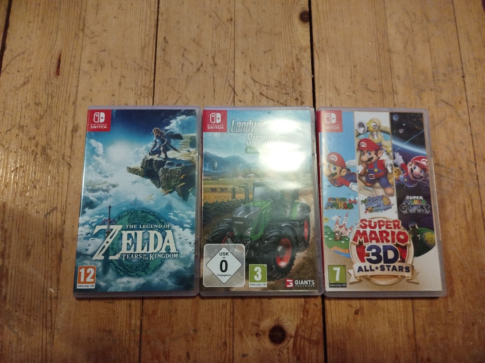 Nintendo Konsolen: Nintendo Switch Mario Red edition mit 3 spielen – Gebraucht aus St. Peterzell von QuieroBailar 3