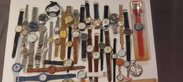 Lot d'une quarantaine de montres quartz divers styles ,état