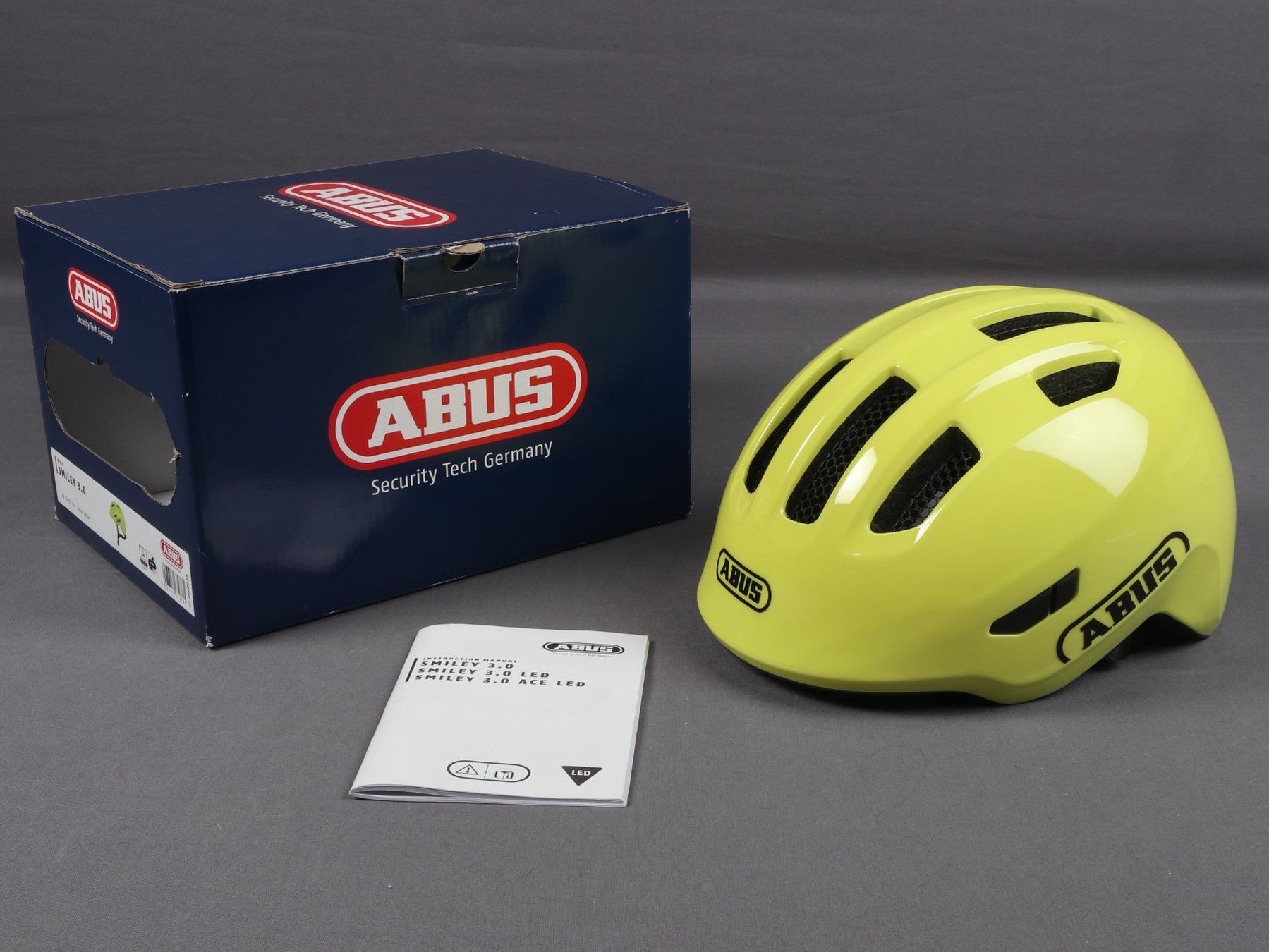 Abus Casques: ABUS SecurityTech Germany, Kids Helm Smiley 3 gelb – Neuf (Voir description) à Steinen par Restwert_Steinen